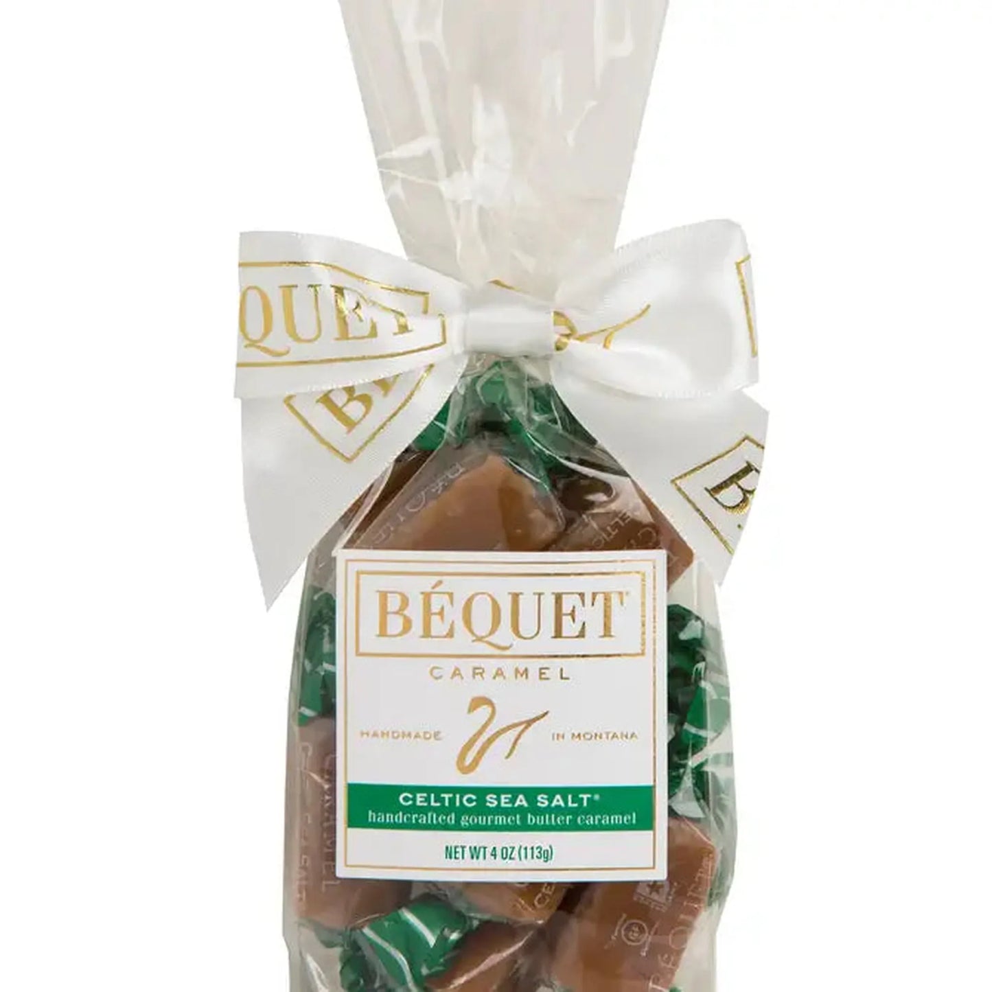 Béquet caramel package with a white bow on a white background
